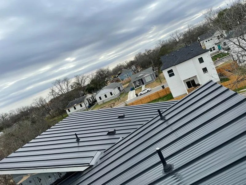 Standing seam metal roof panels with vents for Skylight Repair in North Dansville